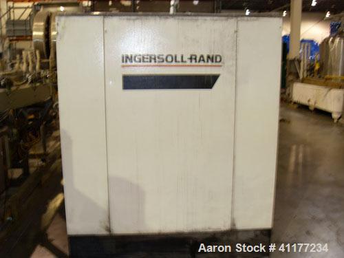 Used Ingersoll-Rand Rotary Screw Air Compressor, Model SSR-EP200. Size 200 HP. Capacity 892 CFM, single stage unit. Rated operating pressure 125 PSI, max discharge pressure 128 PSI, max modulate pres...