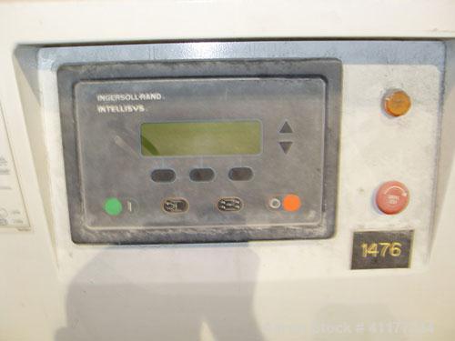 Used Ingersoll-Rand Rotary Screw Air Compressor, Model SSR-EP200. Size 200 HP. Capacity 892 CFM, single stage unit. Rated operating pressure 125 PSI, max discharge pressure 128 PSI, max modulate pres...
