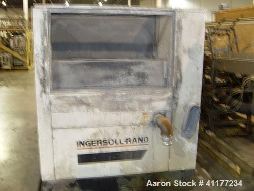 Used Ingersoll-Rand Rotary Screw Air Compressor, Model SSR-EP200. Size 200 HP. Capacity 892 CFM, single stage unit. Rated operating pressure 125 PSI, max discharge pressure 128 PSI, max modulate pres...