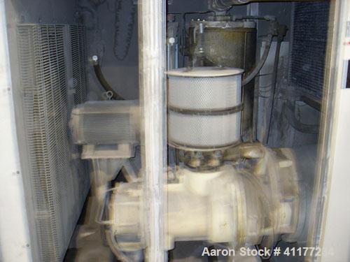 Used Ingersoll-Rand Rotary Screw Air Compressor, Model SSR-EP200. Size 200 HP. Capacity 892 CFM, single stage unit. Rated operating pressure 125 PSI, max discharge pressure 128 PSI, max modulate pres...