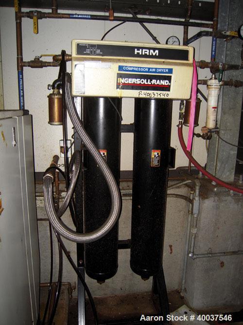 Used Ingeroll Rand Rotary Screw Air Compressor, model SSR-EP30SE. 117 CFM at 125 psi. Driven by a 30 hp,3/60/230/460 volt motor. Includes a model HRM 62-6 air dryer, and an approximately 24" diameter...
