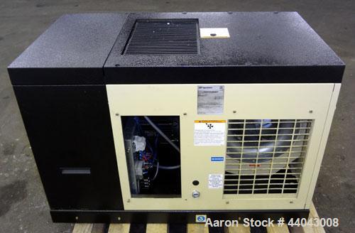 Used Ingersoll-Rand Unigy Rotary Screw Air Compressor, Model UNI-15-150-H. Capacity 53 CFM, rated operating pressure 125psi. Driven by a 12.5kw (15hp), 400 volt motor. Includes a sound enclosure. Bui...