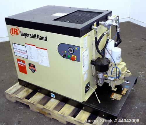 Used Ingersoll-Rand Unigy Rotary Screw Air Compressor, Model UNI-15-150-H. Capacity 53 CFM, rated operating pressure 125psi. Driven by a 12.5kw (15hp), 400 volt motor. Includes a sound enclosure. Bui...