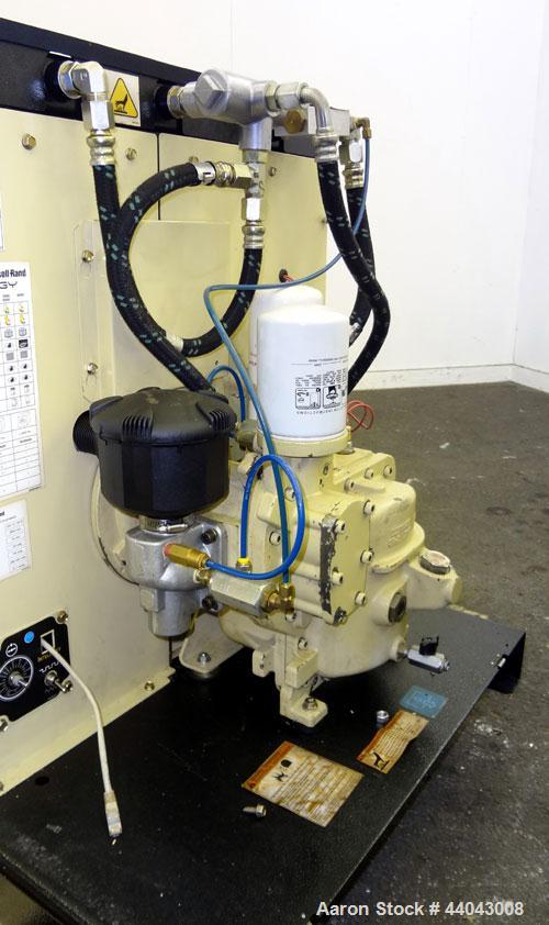 Used Ingersoll-Rand Unigy Rotary Screw Air Compressor, Model UNI-15-150-H. Capacity 53 CFM, rated operating pressure 125psi. Driven by a 12.5kw (15hp), 400 volt motor. Includes a sound enclosure. Bui...