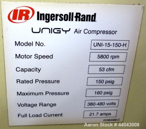 Used Ingersoll-Rand Unigy Rotary Screw Air Compressor, Model UNI-15-150-H. Capacity 53 CFM, rated operating pressure 125psi. Driven by a 12.5kw (15hp), 400 volt motor. Includes a sound enclosure. Bui...