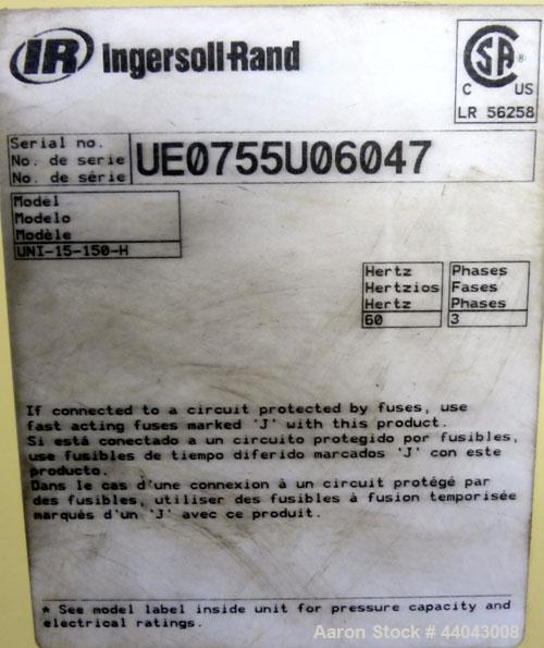 Used Ingersoll-Rand Unigy Rotary Screw Air Compressor, Model UNI-15-150-H. Capacity 53 CFM, rated operating pressure 125psi. Driven by a 12.5kw (15hp), 400 volt motor. Includes a sound enclosure. Bui...