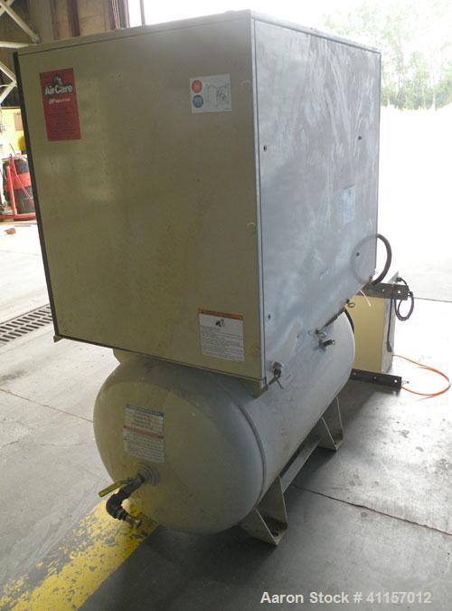 Used Ingersoll-Rand Single Stage Rotary Screw Compressor, Model UP6-10-150. 34 cfm at 150 psi. Air cooled. Driven by a 10 hp, 3/60/203/460 volt, 3515 rpm motor. Mounted on a reciever tank, includes a...