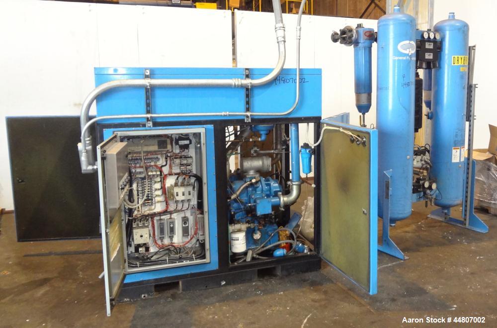 Used Kobelco KNW Series Two Stage Oil Free Rotary Screw Compressor, Model KNW A0-B/H. Air cooled. Rated approximately 223 cfm at 150 psig. Driven by a 60 hp motor. Enclosed in a sound dampening cabin...