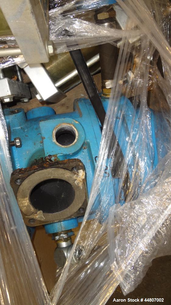 Used Kobelco KNW Series Two Stage Oil Free Rotary Screw Compressor, Model KNW A0-B/H. Air cooled. Rated approximately 223 cfm at 150 psig. Driven by a 60 hp motor. Enclosed in a sound dampening cabin...