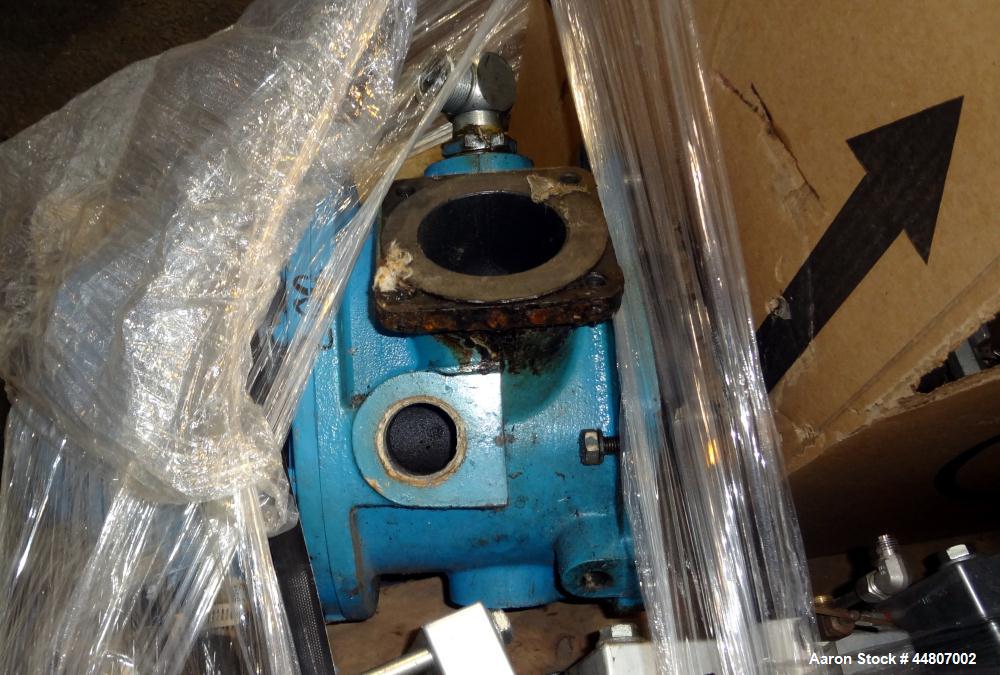 Used Kobelco KNW Series Two Stage Oil Free Rotary Screw Compressor, Model KNW A0-B/H. Air cooled. Rated approximately 223 cfm at 150 psig. Driven by a 60 hp motor. Enclosed in a sound dampening cabin...