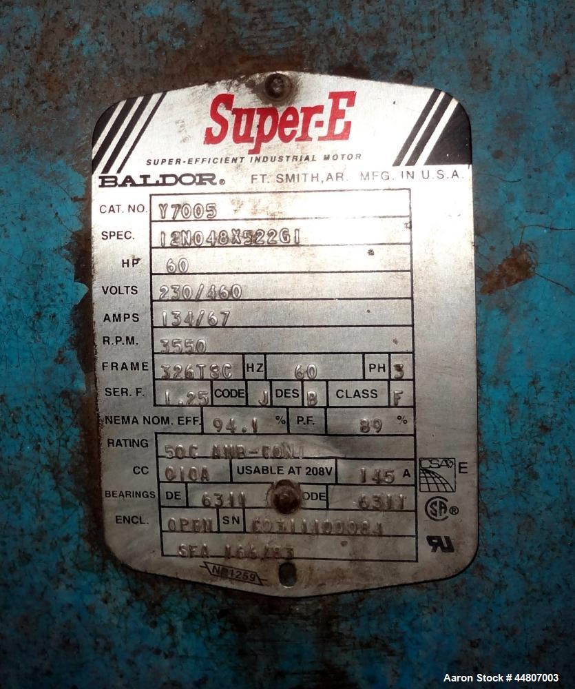 Used Kobelco KNW Series Two Stage Oil Free Rotary Screw Compressor, Model KNW A0-B/H. Air cooled. Rated approximately 223 cfm at 150 psig. Driven by a 60 hp motor. Enclosed in a sound dampening cabin...