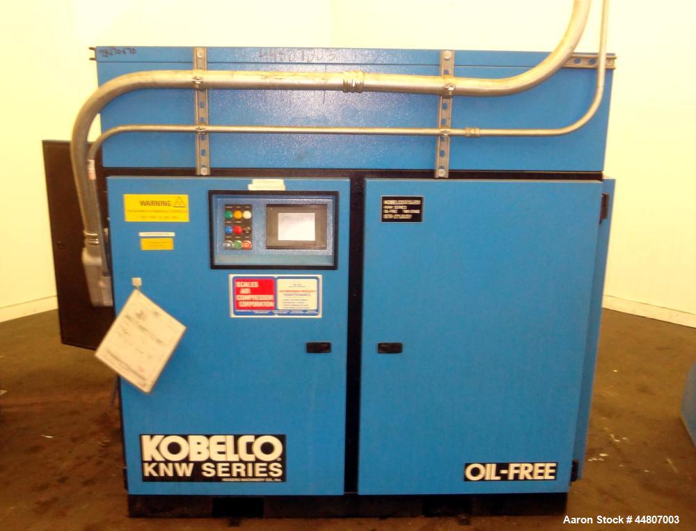Used Kobelco KNW Series Two Stage Oil Free Rotary Screw Compressor, Model KNW A0-B/H. Air cooled. Rated approximately 223 cfm at 150 psig. Driven by a 60 hp motor. Enclosed in a sound dampening cabin...
