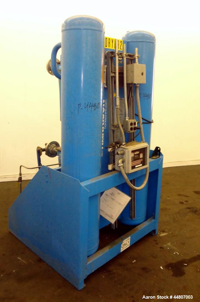 Used Kobelco KNW Series Two Stage Oil Free Rotary Screw Compressor, Model KNW A0-B/H. Air cooled. Rated approximately 223 cfm at 150 psig. Driven by a 60 hp motor. Enclosed in a sound dampening cabin...
