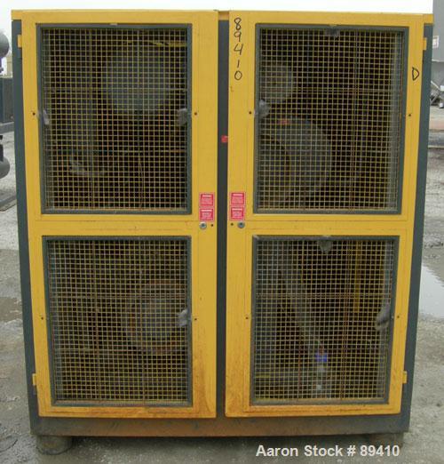 USED: Kaeser stationary rotary screw compressor, model DS140, aircooled. Capacity approximately 520 cfm at 110 psi. Driven by a 100 hp,3/60/460 volt motor. Unit includes a control panel. Skid mounted...