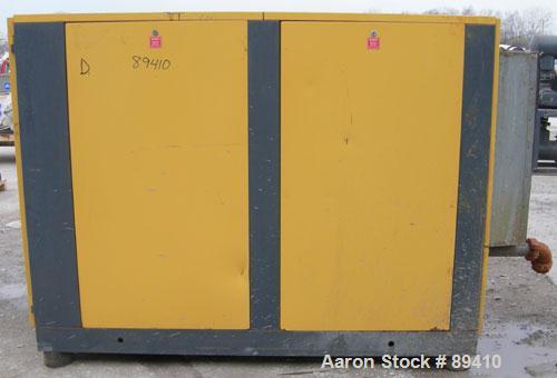 USED: Kaeser stationary rotary screw compressor, model DS140, aircooled. Capacity approximately 520 cfm at 110 psi. Driven by a 100 hp,3/60/460 volt motor. Unit includes a control panel. Skid mounted...