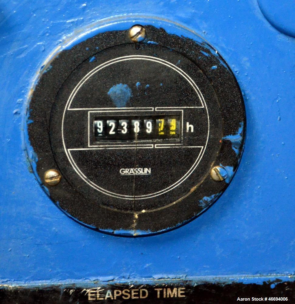 Used Quincy Helical Screw Air Compressor, Model Q235WNW1, Water Cooled. Capacity 234 CFM at 125 psi. Driven by a 50hp, 3/60/230/460 volt, 1760 rpm motor. Includes an air/oil reservoir tank, after coo...