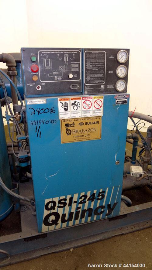 Used Quincy QSI-245 Water cooled  Rotary Screw Compressor, Model QSI245WNW31B. Approximate air delivery 245 cfm at 110 psig. Driven by a 50 hp, 3/60/230/460 volt, 1780 rpm motor. Unit includes contro...