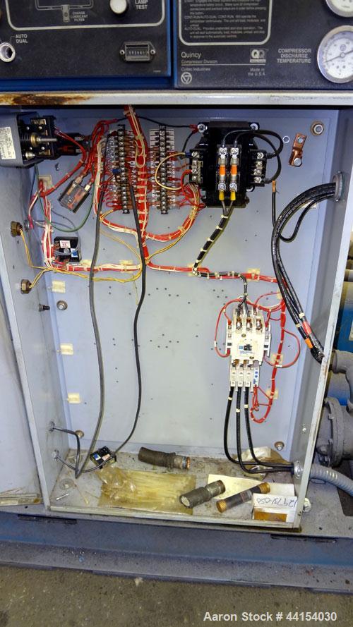 Used Quincy QSI-245 Water cooled  Rotary Screw Compressor, Model QSI245WNW31B. Approximate air delivery 245 cfm at 110 psig. Driven by a 50 hp, 3/60/230/460 volt, 1780 rpm motor. Unit includes contro...