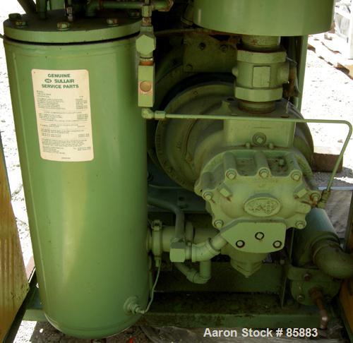 USED: Sullair single stage rotary screw compressor, model 10-25AC/AC 24KT, air cooled. Rated 105 cfm at 115/125 psig. Driven by a 25 hp, 3/60/230/460 volt, 1750 rpm motor. Includes sound enclosure an...
