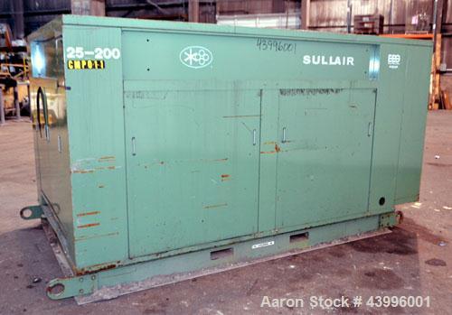 Used Sullair Air Cooled Rotary Screw Air Compressor, Model 25-200H ACAC. Approximately 900 cfm at 150 psig. Driven by a 250hp, 3/60/460 volt, 1770 rpm motor. Includes a control panel, and sound enclo...