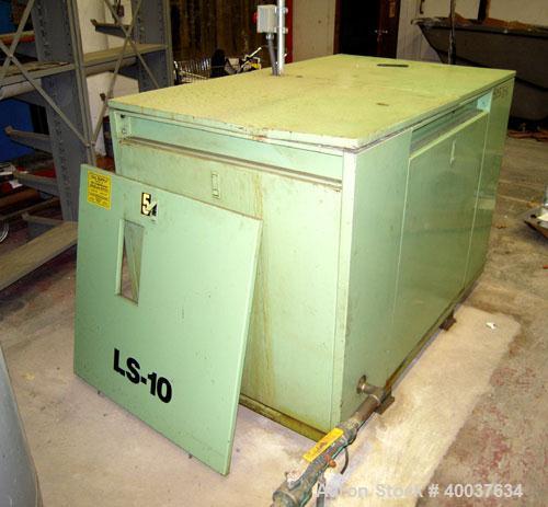 Used Sullair Rotary Screw Air Compressor, model LS-10. Approximately 111 cfm at 100 psig. Approximately 100 psi, and a 25 hp motor. Includes a sound enclosure. Missing controls, 51094 hours on meter....