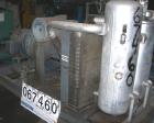 USED:Atlas Copco stationary rotary screw compressor, model GAU-807. Rated max 100 psi, air cooled, capacity approximately 410 cfm at 1770 rpm. Driven by a 100 hp, 3/60/230/460 volt, 1770 rpm motor. U...