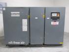 Used Atlas Copco Water Cooled Oil Free Rotary Screw Compressor, Model ZR250. Rated 1100 CFM, 125 psi. Driven by a 300hp, 460 volt motor. Includes an Atlas Copco MD600 air dryer, serial# AID011985, an...