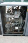 Used Atlas Copco Two Stage Oil Free Rotary Screw Compressor, Model ZR37. Water cooled. Rated approximately 181 cfm at 128 psig. Driven by a 50 hp motor. Enclosed in a sound dampening cabinet. 41,223 ...