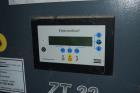 Used Atlas Copco Oil Free Rotary Screw Compressor, Model ZT 22. Air cooled, 117.2 CFM at 124 psi. Driven by a 30hp motor. Includes an Elektronikon controller. Serial# AII705773, built 2006.