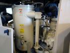 Used Curtis RS Series Rotary Screw Compressor, Model R/S-150D-A/E-E75G. Air cooled, rated 706 cfm at 125 psi. Driven by a 150 hp, 3/60/460 volt, 1780 rpm motor.  Includes a control panel and sound en...