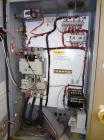 Used Curtis RS Series Rotary Screw Compressor, Model R/S-150D-A/E-E75G. Air cooled, rated 706 cfm at 125 psi. Driven by a 150 hp, 3/60/460 volt, 1780 rpm motor.  Includes a control panel and sound en...