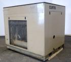 Used Curtis RS Series Rotary Screw Compressor, Model R/S-150D-A/E-E75G. Air cooled, rated 706 cfm at 125 psi. Driven by a 150 hp, 3/60/460 volt, 1780 rpm motor.  Includes a control panel and sound en...