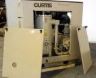 Used Curtis RS Series Rotary Screw Compressor, Model R/S-150D-A/E-E75G. Air cooled, rated 706 cfm at 125 psi. Driven by a 150 hp, 3/60/460 volt, 1780 rpm motor.  Includes a control panel and sound en...