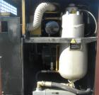 Used Curtis-Toledo Single Stage Rotary Screw Compressor, Model RS10. Oil cooled, 38.5 CFM at 115 psi at 4940 rpm. Driven by a 10 hp motor.Includes a control panel, and sound enclosure. Requires air t...