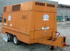 USED: Gardner Denver portable diesel air compressor, approximate 8000 cfm. 70 gallon fuel tank, tandem axle trailer with pintle hitch, 1300 hours on meter.