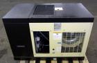Used Ingersoll-Rand Unigy Rotary Screw Air Compressor, Model UNI-15-150-H. Capacity 53 CFM, rated operating pressure 125psi. Driven by a 12.5kw (15hp), 400 volt motor. Includes a sound enclosure. Bui...
