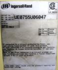 Used Ingersoll-Rand Unigy Rotary Screw Air Compressor, Model UNI-15-150-H. Capacity 53 CFM, rated operating pressure 125psi. Driven by a 12.5kw (15hp), 400 volt motor. Includes a sound enclosure. Bui...
