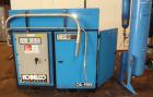 Used Kobelco KNW Series Two Stage Oil Free Rotary Screw Compressor, Model KNW A0-B/H. Air cooled. Rated approximately 223 cfm at 150 psig. Driven by a 60 hp motor. Enclosed in a sound dampening cabin...