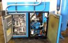 Used Kobelco KNW Series Two Stage Oil Free Rotary Screw Compressor, Model KNW A0-B/H. Air cooled. Rated approximately 223 cfm at 150 psig. Driven by a 60 hp motor. Enclosed in a sound dampening cabin...