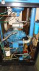 Used Kobelco KNW Series Two Stage Oil Free Rotary Screw Compressor, Model KNW A0-B/H. Air cooled. Rated approximately 223 cfm at 150 psig. Driven by a 60 hp motor. Enclosed in a sound dampening cabin...