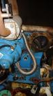 Used Kobelco KNW Series Two Stage Oil Free Rotary Screw Compressor, Model KNW A0-B/H. Air cooled. Rated approximately 223 cfm at 150 psig. Driven by a 60 hp motor. Enclosed in a sound dampening cabin...