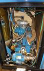 Used Kobelco KNW Series Two Stage Oil Free Rotary Screw Compressor, Model KNW A0-B/H. Air cooled. Rated approximately 223 cfm at 150 psig. Driven by a 60 hp motor. Enclosed in a sound dampening cabin...