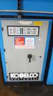Used Kobelco KNW Series Two Stage Oil Free Rotary Screw Compressor, Model KNW A0-B/H. Air cooled. Rated approximately 223 cfm at 150 psig. Driven by a 60 hp motor. Enclosed in a sound dampening cabin...