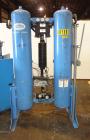 Used Kobelco KNW Series Two Stage Oil Free Rotary Screw Compressor, Model KNW A0-B/H. Air cooled. Rated approximately 223 cfm at 150 psig. Driven by a 60 hp motor. Enclosed in a sound dampening cabin...