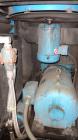 Used Kobelco KNW Series Two Stage Oil Free Rotary Screw Compressor, Model KNW A0-B/H. Air cooled. Rated approximately 223 cfm at 150 psig. Driven by a 60 hp motor. Enclosed in a sound dampening cabin...
