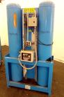 Used Kobelco KNW Series Two Stage Oil Free Rotary Screw Compressor, Model KNW A0-B/H. Air cooled. Rated approximately 223 cfm at 150 psig. Driven by a 60 hp motor. Enclosed in a sound dampening cabin...