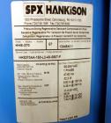Used Kobelco KNW Series Two Stage Oil Free Rotary Screw Compressor, Model KNW A0-B/H. Air cooled. Rated approximately 223 cfm at 150 psig. Driven by a 60 hp motor. Enclosed in a sound dampening cabin...