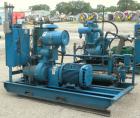 Used Quincy Helical Screw Air Compressor, Model QSI235WNW2, Water Cooled. Capacity 234 cfm at 110 psi. Driven by a 50 hp, 3/60/230/460 volt, 1780 rpm motor. Includes an air/oil reservoir tank, water ...