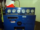 Used Quincy Helical Screw Air Compressor, Model Q235WNW1, Water Cooled. Capacity 234 CFM at 125 psi. Driven by a 50hp, 3/60/230/460 volt, 1760 rpm motor. Includes an air/oil reservoir tank, after coo...