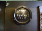 Used Sullair Rotary Screw Air Compressor, model 25-200H ACAC. Single stage, air cooled. Approximately 1218 cfm at 115/125 psig. Driven by a 200 hp, 3/60/460 volt, 1780 rpm motor. Includes a control p...